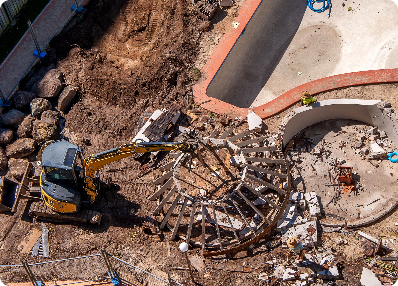 excavator-destroys-old-swimming-pool-2026-01-07-05-43-43-utc